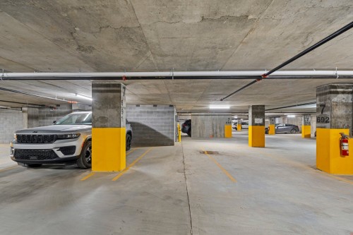 Stationnement - 603-3671 Av. Jean-Béraud, Laval (Chomedey), QC - Indoor Photo Showing Garage