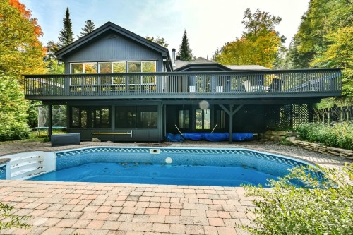 Face arrière - 109 Ch. Des Outardes, Mont-Blanc, QC - Outdoor With In Ground Pool With Deck Patio Veranda