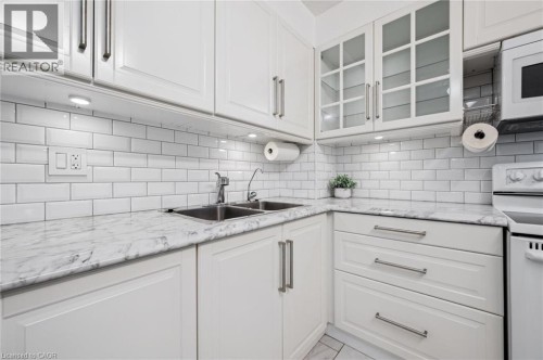 93 Westwood Road Unit# 607, Guelph, ON - Indoor Photo Showing Kitchen With Double Sink With Upgraded Kitchen
