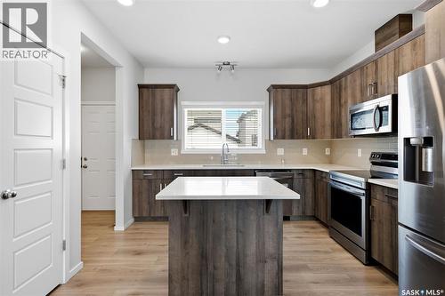 5116 Primrose Green Drive E, Regina, SK - Indoor Photo Showing Kitchen With Stainless Steel Kitchen With Upgraded Kitchen