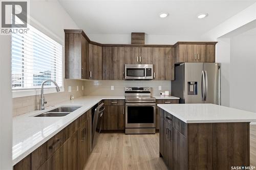 5116 Primrose Green Drive E, Regina, SK - Indoor Photo Showing Kitchen With Stainless Steel Kitchen With Double Sink With Upgraded Kitchen
