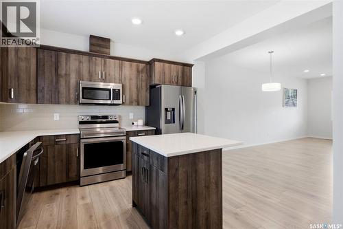 5116 Primrose Green Drive E, Regina, SK - Indoor Photo Showing Kitchen With Stainless Steel Kitchen With Upgraded Kitchen
