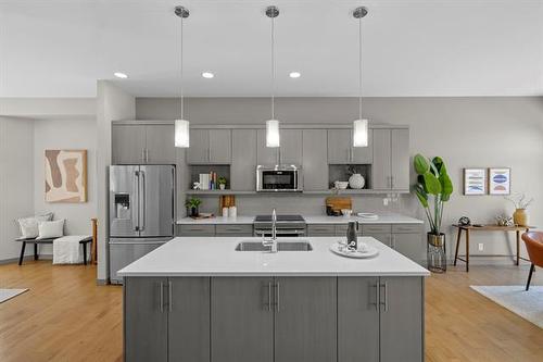 46 Stan Bailie Dr, Winnipeg, MB - Indoor Photo Showing Kitchen With Upgraded Kitchen
