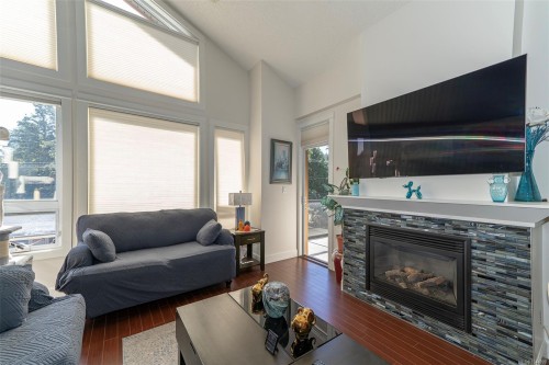 #402-3210 Jacklin Rd, Langford, BC - Indoor Photo Showing Living Room With Fireplace