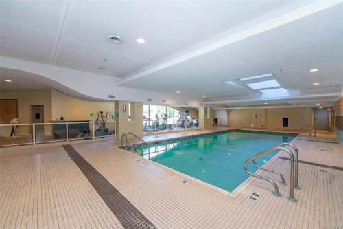#402-3210 Jacklin Rd, Langford, BC - Indoor Photo Showing Other Room With In Ground Pool