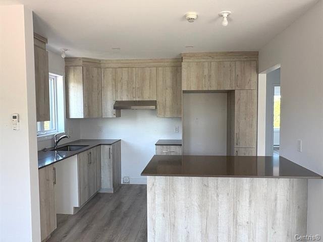 7 313 Av Nault — photo 3