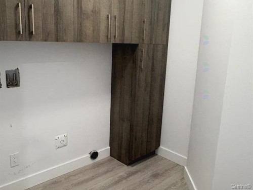 Salle familiale - 4-313 Av. Nault, Rouyn-Noranda, QC - Indoor Photo Showing Other Room