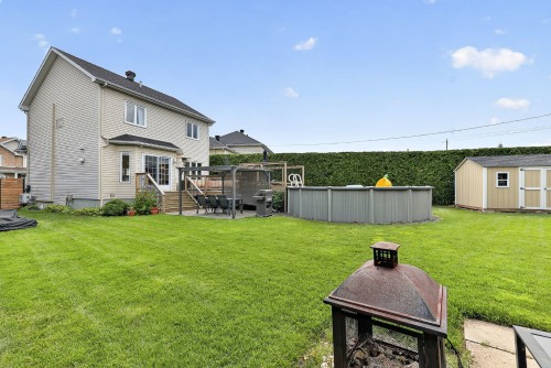 Face arrière - 38 Rue Toupin, Saint-Constant, QC - Outdoor With Backyard