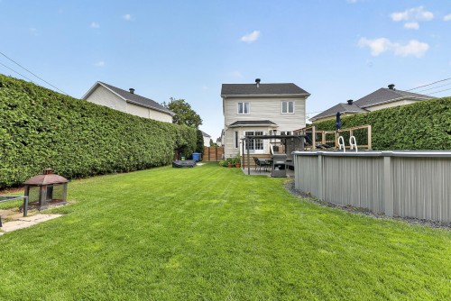 Face arrière - 38 Rue Toupin, Saint-Constant, QC - Outdoor With Backyard