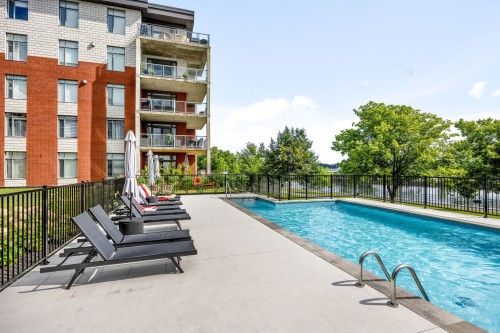 Piscine - 401-75 Rue Richelieu, Saint-Jean-Sur-Richelieu, QC - Outdoor With In Ground Pool
