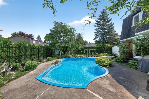 Pool - 417 Boul. Beaconsfield, Beaconsfield, QC - Outdoor With In Ground Pool With Backyard