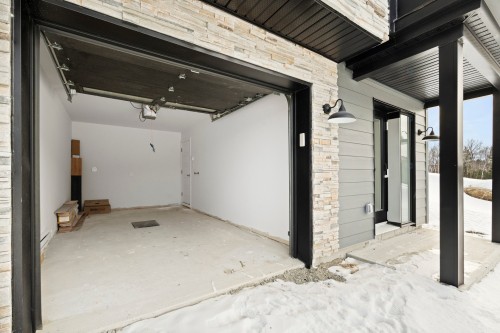Garage - 703 Ch. Des Conifères, Piedmont, QC - Indoor Photo Showing Garage