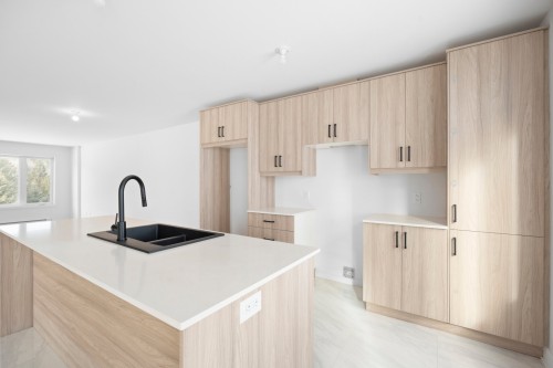 Kitchen - 703 Ch. Des Conifères, Piedmont, QC - Indoor Photo Showing Kitchen With Double Sink