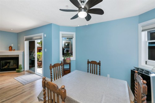 #106-650 Dobson Rd, Duncan, BC - Indoor Photo Showing Dining Room With Fireplace
