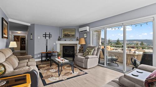 107-3815 Brown Road, West Kelowna, BC - Indoor Photo Showing Living Room With Fireplace