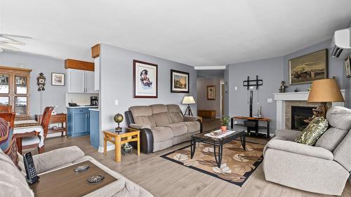 107-3815 Brown Road, West Kelowna, BC - Indoor Photo Showing Living Room With Fireplace