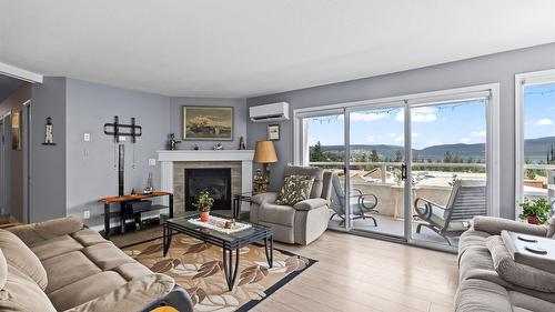 107-3815 Brown Road, West Kelowna, BC - Indoor Photo Showing Living Room With Fireplace