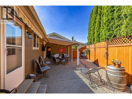 Side Yard with covered patio - 2208 Mimosa Drive, West Kelowna, BC 