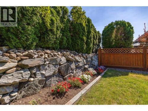 Large beautiful landscaped backyard fully fenced. - 2208 Mimosa Drive, West Kelowna, BC 