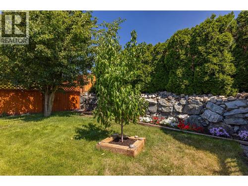 Large beautiful landscaped backyard fully fenced. - 2208 Mimosa Drive, West Kelowna, BC 