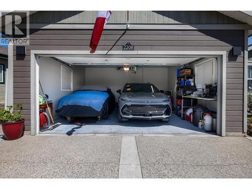 Large double car garage with EV hook up. Owner will be taking EV Charger - 2208 Mimosa Drive, West Kelowna, BC 