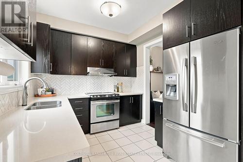 46 Pearcey Crescent, Barrie, ON - Indoor Photo Showing Kitchen With Stainless Steel Kitchen With Double Sink With Upgraded Kitchen