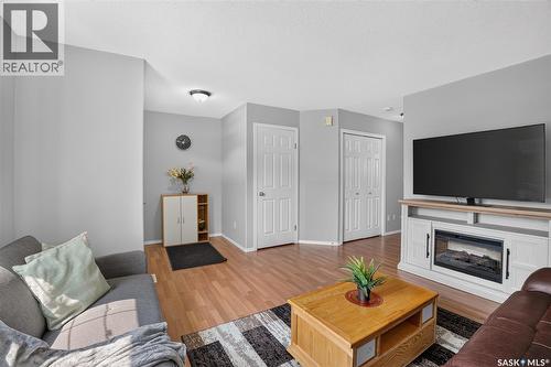 13 102 Pawlychenko Lane, Saskatoon, SK - Indoor Photo Showing Living Room With Fireplace