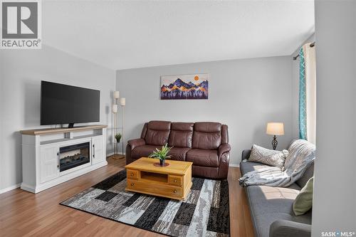 13 102 Pawlychenko Lane, Saskatoon, SK - Indoor Photo Showing Living Room With Fireplace