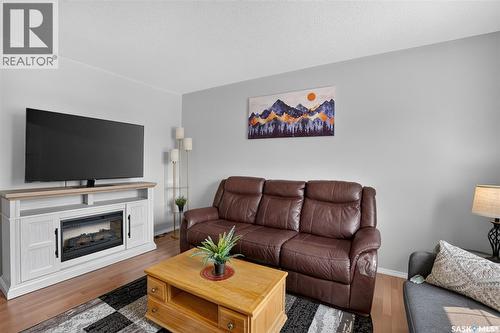 13 102 Pawlychenko Lane, Saskatoon, SK - Indoor Photo Showing Living Room With Fireplace