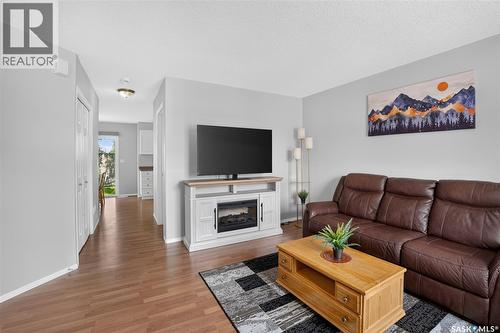 13 102 Pawlychenko Lane, Saskatoon, SK - Indoor Photo Showing Living Room With Fireplace