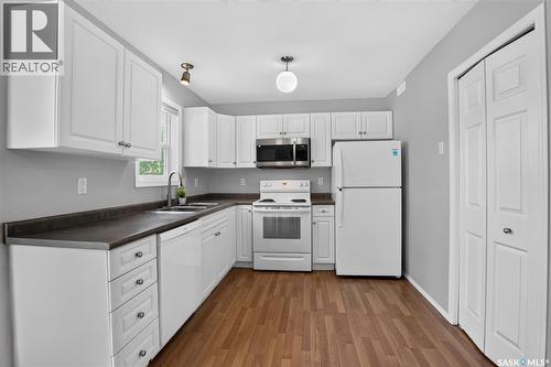 13 102 Pawlychenko Lane, Saskatoon, SK - Indoor Photo Showing Kitchen With Double Sink