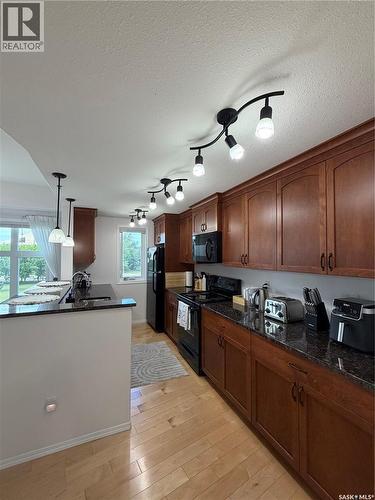 210 1220 Blackfoot Drive, Regina, SK - Indoor Photo Showing Kitchen