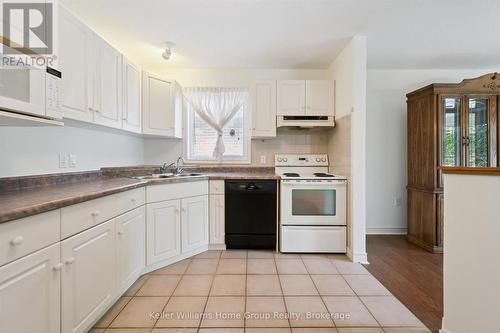 6 Parkside Drive, Guelph (Village By The Arboretum), ON - Indoor Photo Showing Kitchen With Double Sink