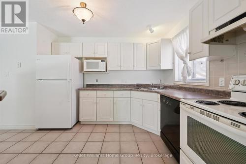6 Parkside Drive, Guelph (Village By The Arboretum), ON - Indoor Photo Showing Kitchen With Double Sink
