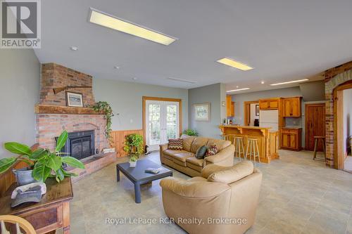 7120 Sixth Line, Centre Wellington, ON - Indoor Photo Showing Living Room With Fireplace