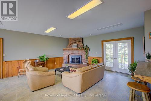7120 Sixth Line, Centre Wellington, ON - Indoor Photo Showing Living Room With Fireplace