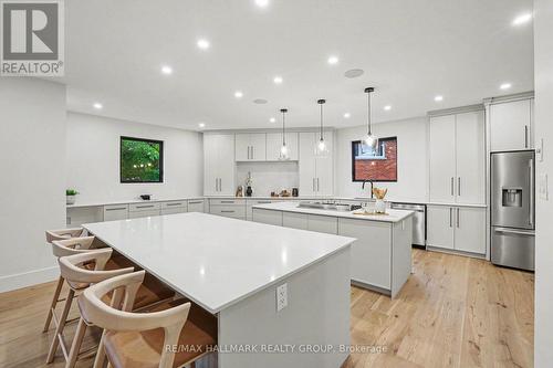 Double Island with quartz counter tops. - 218 Woodland Avenue, Ottawa, ON - Indoor Photo Showing Kitchen With Upgraded Kitchen