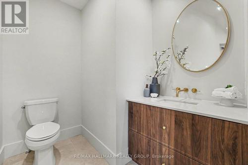 Elegant main floor powder room. - 218 Woodland Avenue, Ottawa, ON - Indoor Photo Showing Bathroom