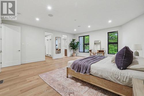 Built-in speakers ~ pot-lighting ~ WIC - 218 Woodland Avenue, Ottawa, ON - Indoor Photo Showing Bedroom