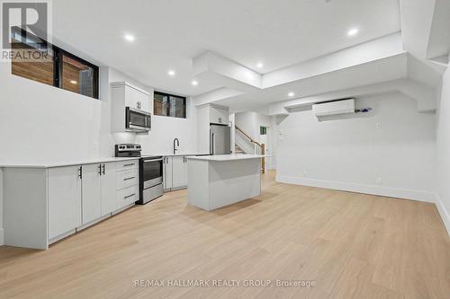 High efficiency heat pump/ central air for apt. - 218 Woodland Avenue, Ottawa, ON - Indoor Photo Showing Kitchen