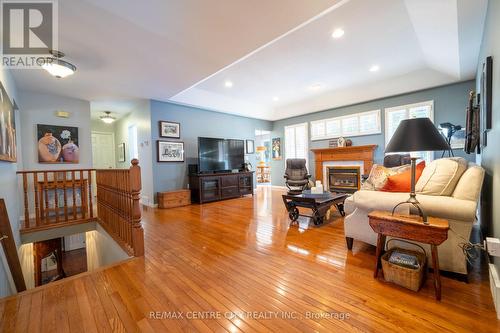 61 Aberdeen Drive, Middlesex Centre (Coldstream), ON - Indoor Photo Showing Living Room With Fireplace