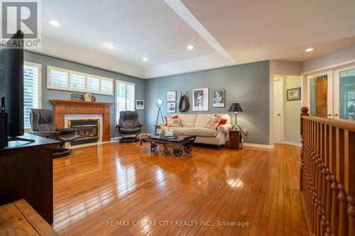 61 Aberdeen Drive, Middlesex Centre (Coldstream), ON - Indoor Photo Showing Living Room With Fireplace
