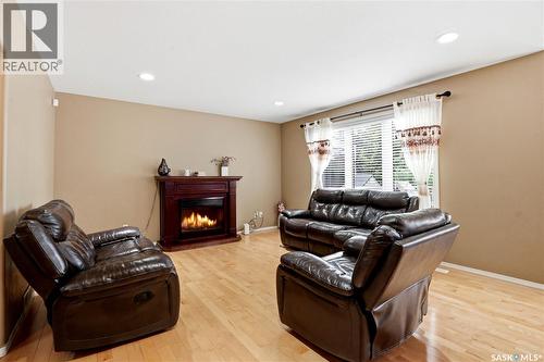 110 Stepney Crescent, Saskatoon, SK - Indoor Photo Showing Living Room With Fireplace