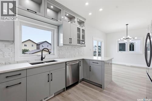 1215 Nightingale Terrace, Saskatoon, SK - Indoor Photo Showing Kitchen With Double Sink With Upgraded Kitchen