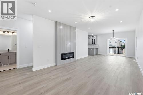 1215 Nightingale Terrace, Saskatoon, SK - Indoor Photo Showing Living Room With Fireplace