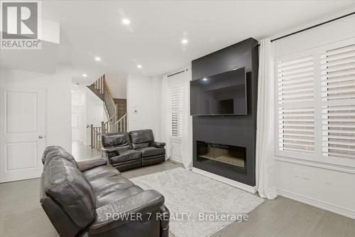 94 Conarty Crescent, Whitby, ON - Indoor Photo Showing Living Room With Fireplace