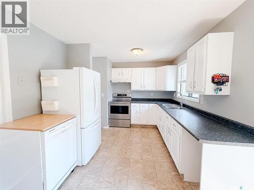 1026 Kingsmere Boulevard, Saskatoon, SK - Indoor Photo Showing Kitchen With Double Sink