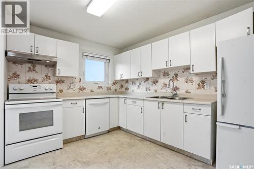 212 217A Cree Place, Saskatoon, SK - Indoor Photo Showing Kitchen With Double Sink