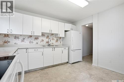 212 217A Cree Place, Saskatoon, SK - Indoor Photo Showing Kitchen With Double Sink