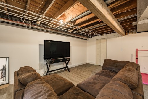 Salle familiale - 1435 Ch. Delorme, Farnham, QC - Indoor Photo Showing Basement